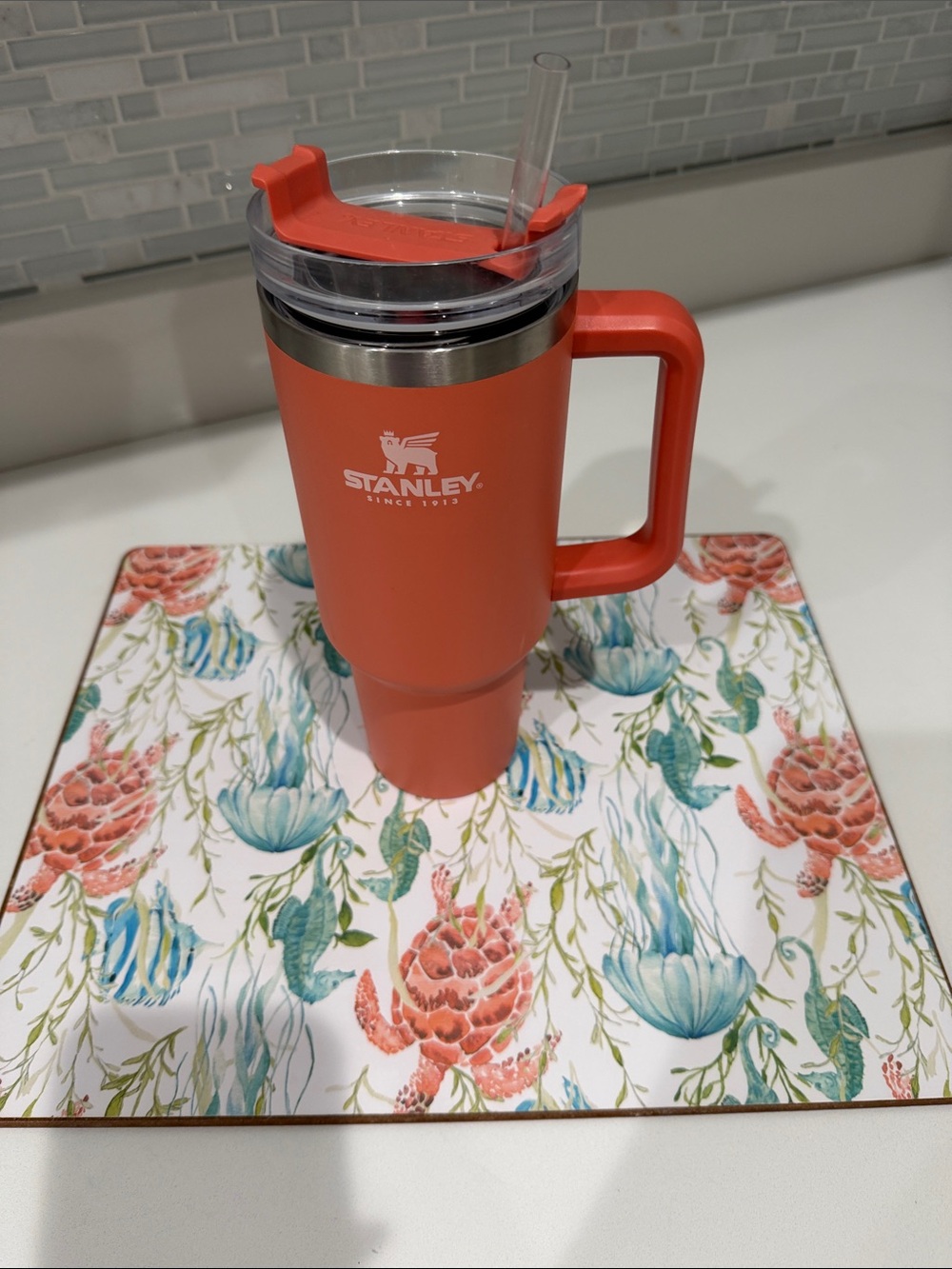 Stanley Orange Travel Tumbler with Handle and Clear Straw Lid